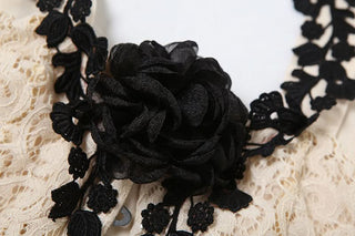 Off shoulder flower applique button top