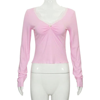 Lace hem long sleeve v neck ruched top