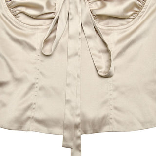 Ruched cross back zip-up bowknot top
