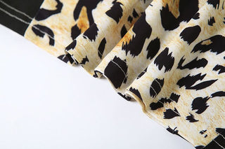 Leopard print v neck backless cami mini dress