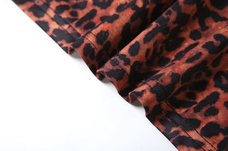 Irregular hollow out leopard print cut out mini dress
