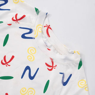 Crewneck cap sleeve print stitch ruched top