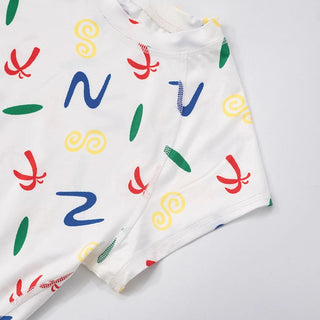 Crewneck cap sleeve print stitch ruched top