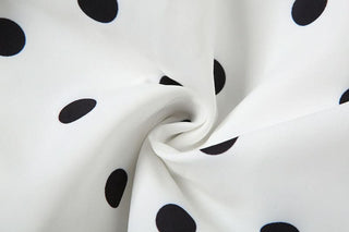 Polka dot halter smocked mini dress