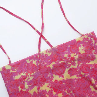 Cross back self tie cowl neck print mini dress