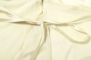 Halter shell applique backless top