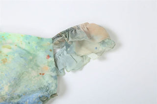 Ruched v neck ruffle print zip-up midi dress