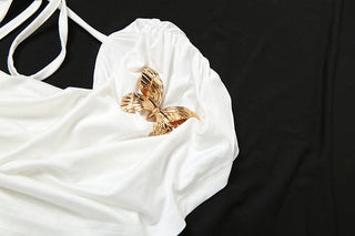 Ruched self tie cowl neck butterfly applique top