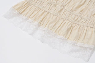 Cap sleeve smocked lace hem ruffle top