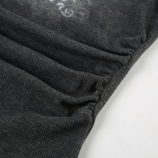 Buckle ruched ribbed abstract u neck top