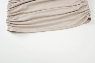 Long sleeve off shoulder ruched mini dress