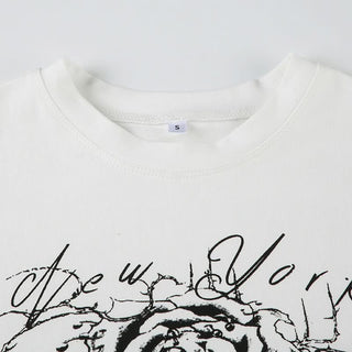 Crewneck short sleeve rose print contrast top