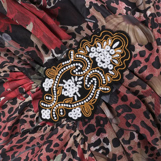 Irregular self tie halter deep v neck print mini dress