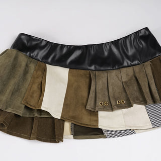 Pleated patchwork irregular mini skirt