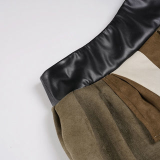 Pleated patchwork irregular mini skirt
