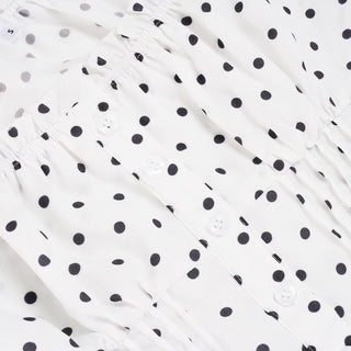 Polka dot cap sleeve button ruffle top