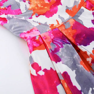 Pleated v neck self tie print cami mini dress