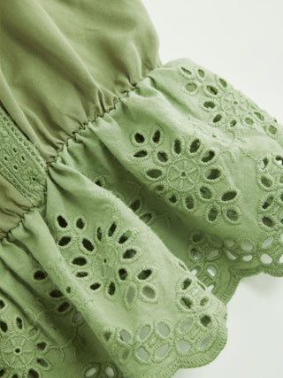 Eyelet Scoop Neck Tie Front Tassel Ruffle Hem Cami Blouse