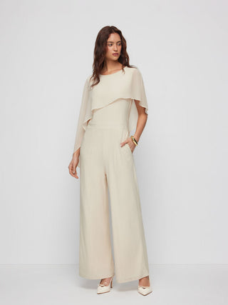 Asymmetrical Cloak Sleeve Mid Rise Wide Leg Jumpsuit With Cape