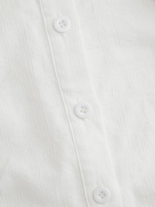 Cotton-blend Textured Boat Neck Puff Sleeve Button Through Peplum Blouse