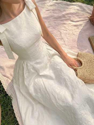 Jacquard Sculptural Boat Neck Bowknot Backless Flared Maxi Dress