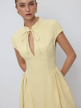Stand Collar Tie-Neck Short Sleeve Draped Pocket Flared Maxi Dress