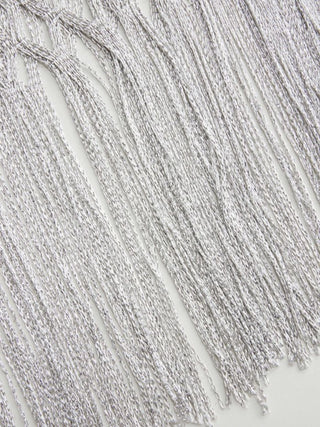 KNITTED FRINGED CAPE