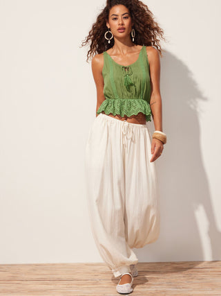 Eyelet Scoop Neck Tie Front Tassel Ruffle Hem Cami Blouse