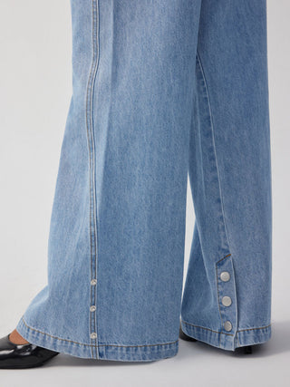 Denim Mid Rise Flared Tapered Back Metal Detail Trousers