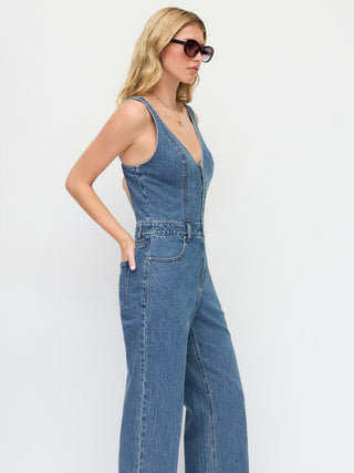 Stretch Denim Mid Rise Scoop Neckline Metal Detail Wide Leg Jumpsuit
