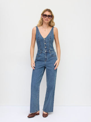 Stretch Denim Mid Rise Scoop Neckline Metal Detail Wide Leg Jumpsuit