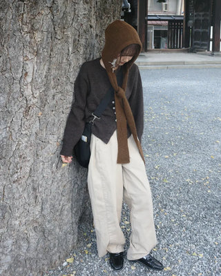 Side-tucked white cotton pants