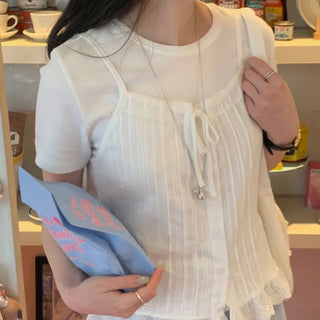 Ribbon-tucked bustier sleeveless blouse
