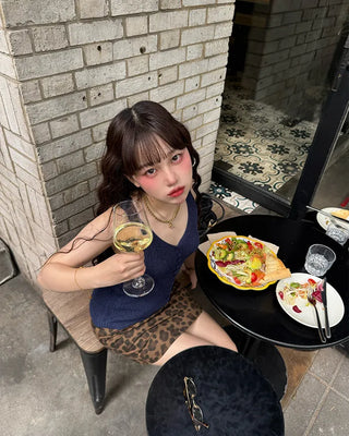 V-neck button-up knit vest