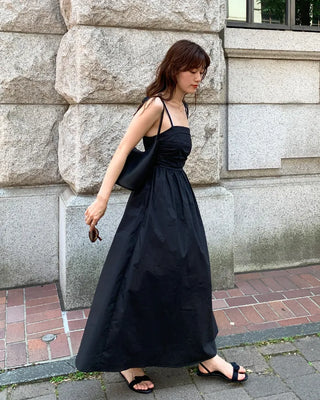 Side-tucked flared long dress