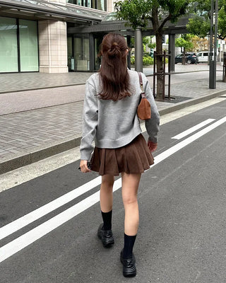 Belted corduroy pleated mini skirt