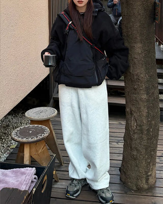 Wide sweatpants with side pockets