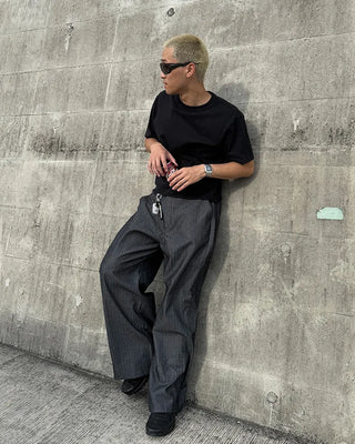 Side-tuck denim slacks