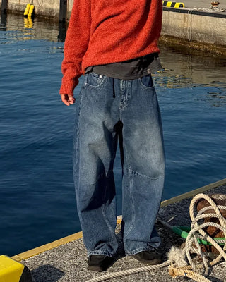 Pointed denim pants with contrasting panels