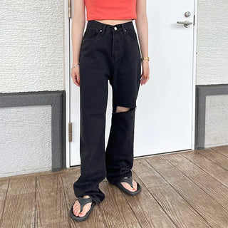 Distressed black denim pants