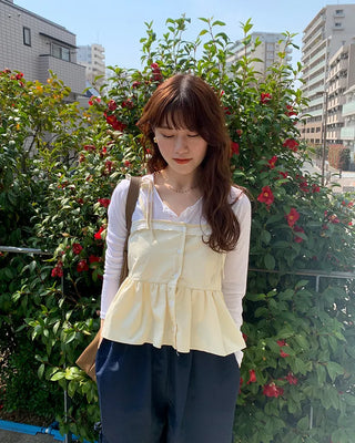 Lace-line shirred sleeveless blouse