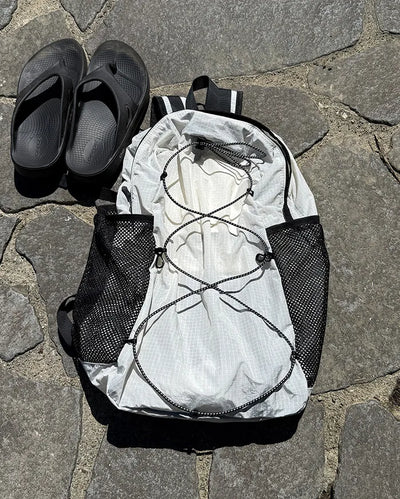 Mesh pocket drawstring backpack