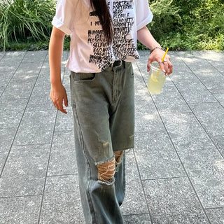 Distressed denim pants