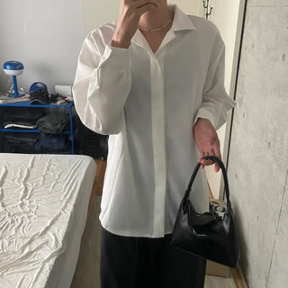 Hidden button open collar shirt