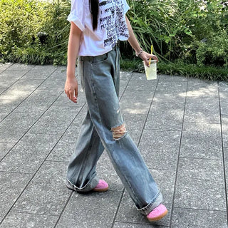Distressed denim pants