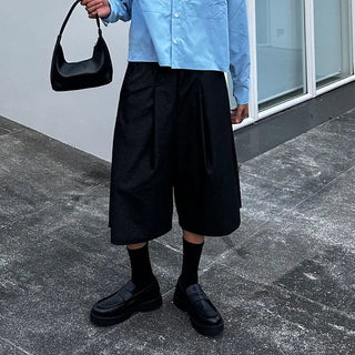 Pleated denim shorts