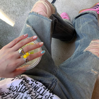 Distressed denim pants