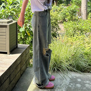Distressed denim pants