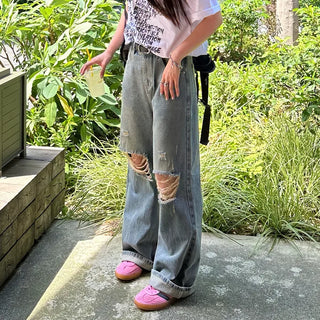 Distressed denim pants