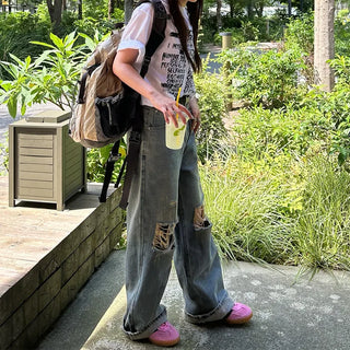 Distressed denim pants